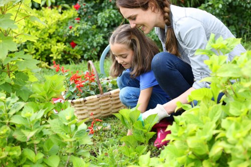 Gardener arriving at a property with tools